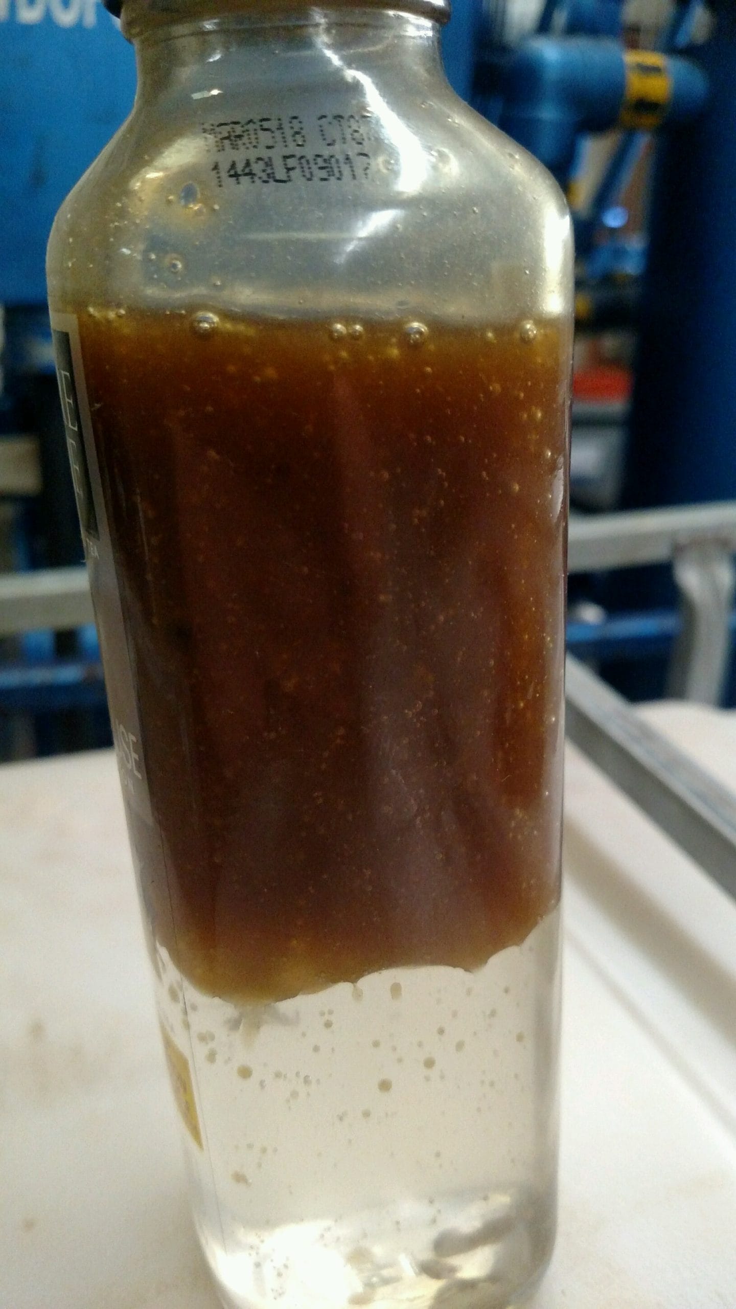Dirty gearbox oil (ISO 320) before filtration Dirty gearbox oil (ISO 320) before filtration