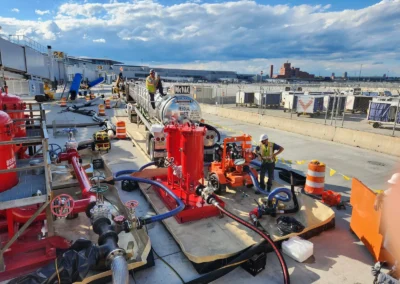 Wide view of airport flushing job with multiple Precision Filtration Products systems in operation for high-volume fluid filtration