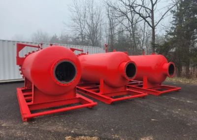 Multiple high flow filter vessels staged at Precision Filtration Products facility, ready for shipment to industrial job sites
