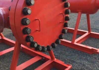 Side view of a 7-round high flow particulate pre-filter vessel used for large-volume industrial fluid filtration