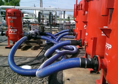 Composite cargo hose installation connected to PFP filter vessels for fuel and fluid transfer operations