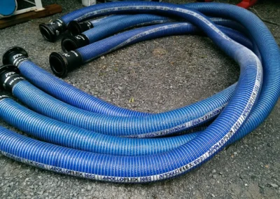 Industrial cargo hose used for transferring fuel and fluids between filtration equipment and storage systems