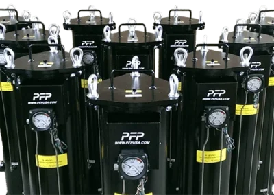 Single hydraulic cartridge filter housings for high-pressure fluid filtration in industrial systems
