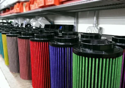 High-performance motorsports filters for racing engines and competition vehicles