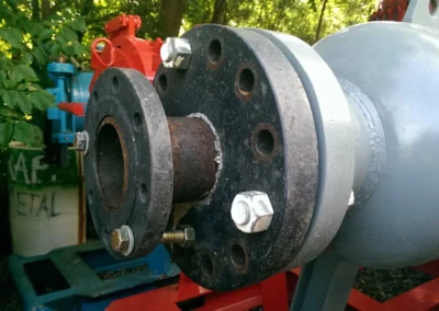 Pipe fitting reducer installed on Precision Filtration Products rental filtration system for flow size transition