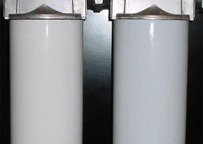 Spin-on filter panel system with multiple elements for fluid or fuel filtration