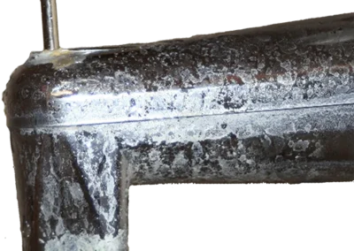 Limescale buildup on a tub faucet caused by hard water mineral deposits
