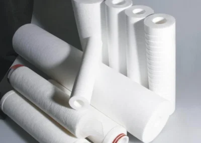 Meltblown filter cartridges used for depth filtration of fine particles in industrial liquids and process fluids