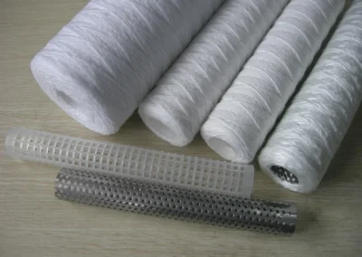 Interior view of string wound filter cartridges showing plastic and metal core construction for industrial filtration applications